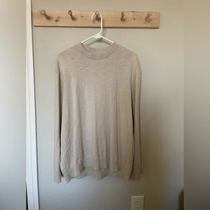 Nice means tan sweater